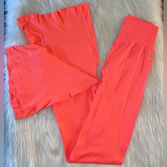 21. New FP Movement Good Karma Leggings in Neon Coral - Picture 2 of 6